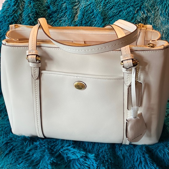 Coach Handbags - Coach Like New Peyton Leather Double Zip Carryall Bag
